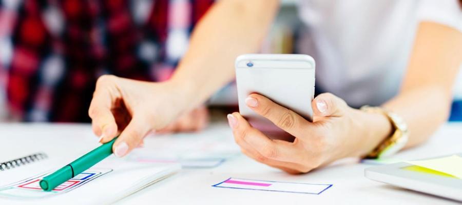 Developers working on a mobile app