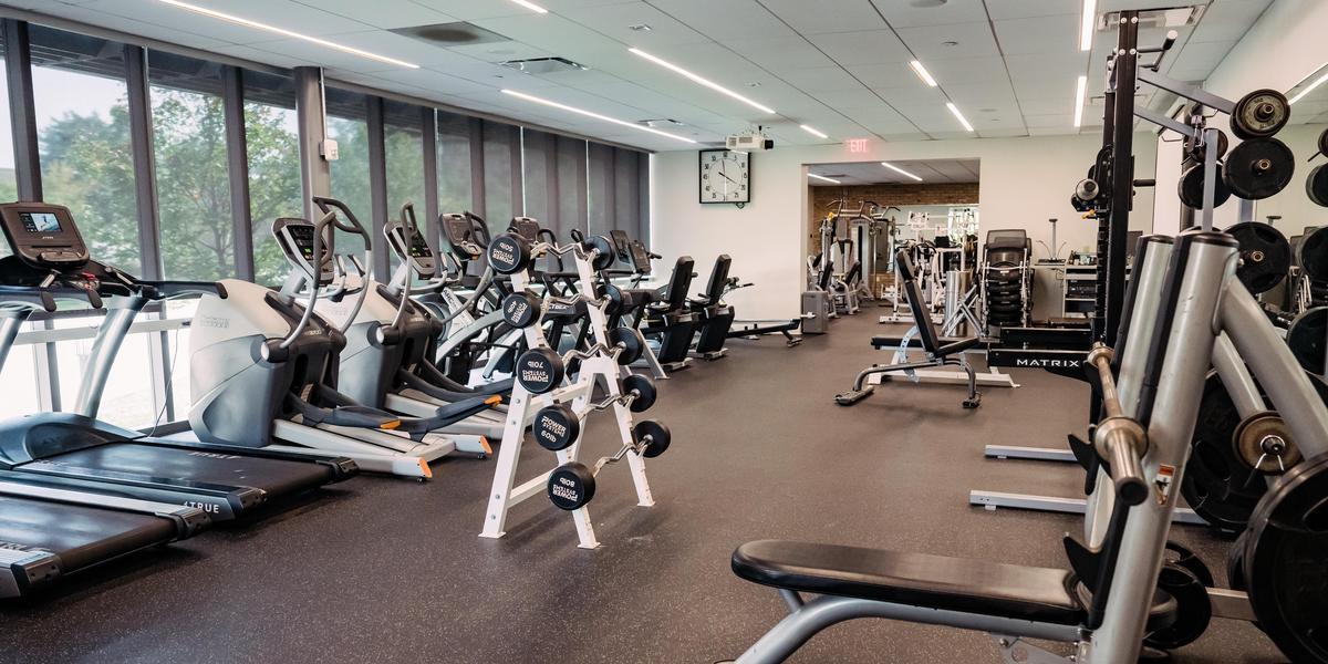 Exercise machines inside the fitness center at AACC.