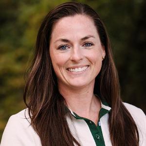Headshot of Katherine Keough with trees in the background